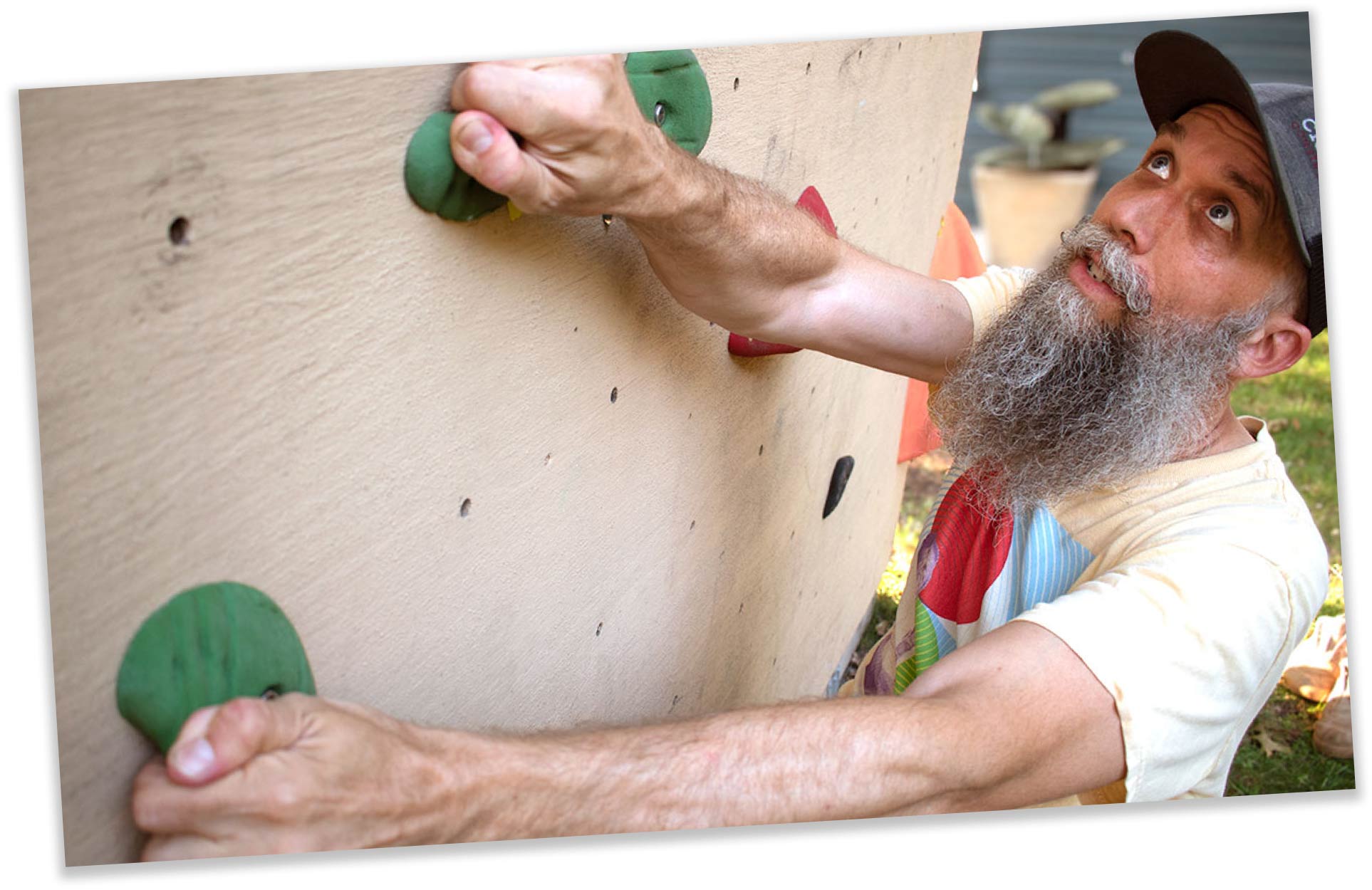 W Scott Padgett on the practice climbing wall with the kiddos.